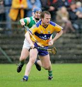 26 March 2006; Barry Nugent, Clare, in action against David Franks, Offaly. Allianz National Hurling League, Division 1A, Round 4, Clare v Offaly, Cusack Park, Ennis, Co. Clare. Picture credit: Kieran Clancy / SPORTSFILE