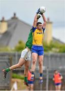 18 May 2014; Donie Shine, Roscommon, in action against Donal Wrynn, Leitrim. Connacht GAA Football Senior Championship Quarter-Final, Roscommon v Leitrim, Dr. Hyde Park, Roscommon. Picture credit: Barry Cregg / SPORTSFILE