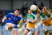 18 May 2014; Mark Hughes, Longford, in action against Johnny Moloney, Offaly. Leinster GAA Football Senior Championship Round 1, Longford v Offaly, Pearse Park, Longford. Photo by Sportsfile