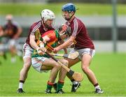 18 May 2014; Gary Kelly, Carlow, in action against Alan Devine, left, and Robbie Greville, Westmeath. GAA All-Ireland Senior Hurling Championship Qualifier Group - Round 4, Carlow v Westmeath. Dr. Cullen Park, Carlow. Picture credit: Pat Murphy / SPORTSFILE