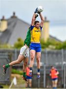 18 May 2014; Donie Shine, Roscommon, in action against Donal Wrynn, Leitrim. Connacht GAA Football Senior Championship Quarter-Final, Roscommon v Leitrim, Dr. Hyde Park, Roscommon. Picture credit: Barry Cregg / SPORTSFILE