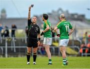 18 May 2014; Darren Sweeney, Leitrim, is shown the black card by referee Conor Lane during the first half. Connacht GAA Football Senior Championship Quarter-Final, Roscommon v Leitrim, Dr. Hyde Park, Roscommon. Picture credit: Piaras Ó Mídheach / SPORTSFILE
