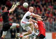 18 May 2014; Niall Morgan, left, and Danny McBride, Tyrone, in action against Donal O'Hare, Down. Ulster GAA Football Senior Championship Preliminary Round, Tyrone v Down. Healy Park, Omagh, Co. Tyrone. Picture credit: Stephen McCarthy / SPORTSFILE