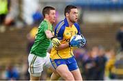 18 May 2014; Donie Shine, Roscommon, in action against Barry Prior, Leitrim. Connacht GAA Football Senior Championship Quarter-Final, Roscommon v Leitrim, Dr. Hyde Park, Roscommon. Picture credit: Barry Cregg / SPORTSFILE