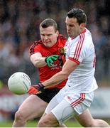 18 May 2014; Daniel McCartan, Down, in action against Kyle Coney, Tyrone. Ulster GAA Football Senior Championship Preliminary Round, Tyrone v Down, Healy Park, Omagh, Co. Tyrone. Picture credit: Oliver McVeigh / SPORTSFILE