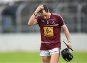 18 May 2014; Westmeath's Eoin Price at the final whistle after defeat against Carlow. GAA All-Ireland Senior Hurling Championship Qualifier Group - Round 4, Carlow v Westmeath. Dr. Cullen Park, Carlow. Picture credit: Pat Murphy / SPORTSFILE