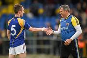 18 May 2014; Longford manager Jack Sheedy shakes hands with Colm Smyth, Longford, after the game. Leinster GAA Football Senior Championship Round 1, Longford v Offaly, Pearse Park, Longford. Photo by Sportsfile