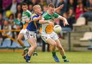 18 May 2014; Peter Cunningham, Offaly, in action against Dermot Brady, Longford. Leinster GAA Football Senior Championship Round 1, Longford v Offaly, Pearse Park, Longford. Photo by Sportsfile