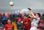 18 May 2014; Kyle Coney, Tyrone, in action against Danile McCartan, Down. Ulster GAA Football Senior Championship Preliminary Round, Tyrone v Down. Healy Park, Omagh, Co. Tyrone. Picture credit: Stephen McCarthy / SPORTSFILE