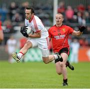 18 May 2014; Mark Donnelly, Tyrone, in action against Bennty Coulter, Down. Ulster GAA Football Senior Championship Preliminary Round, Tyrone v Down, Healy Park, Omagh, Co. Tyrone. Picture credit: Oliver McVeigh / SPORTSFILE