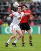 18 May 2014; Mark Poland, Down, in action against Aidan McCrory, Tyrone. Ulster GAA Football Senior Championship Preliminary Round, Tyrone v Down, Healy Park, Omagh, Co. Tyrone. Picture credit: Oliver McVeigh / SPORTSFILE
