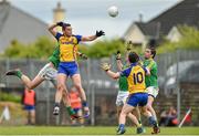 18 May 2014; Donie Shine, Roscommon, breaks a high ball down as he is challenged by Donal Wrynn, Leitrim to team-mate David O'Gara, right, and Barry Prior, third from right, and Darren Sweeney, Leitrim. Connacht GAA Football Senior Championship Quarter-Final, Roscommon v Leitrim, Dr. Hyde Park, Roscommon.  Picture credit: Barry Cregg / SPORTSFILE