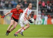 18 May 2014; Mark Donnelly, Tyrone, in action against Brendan Coulter, Down. Ulster GAA Football Senior Championship Preliminary Round, Tyrone v Down, Healy Park, Omagh, Co. Tyrone. Picture credit: Oliver McVeigh / SPORTSFILE