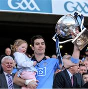 27 April 2014; Michael Darragh Macauley, Dublin, lifts the cup at the end of the game. Allianz Football League Division 1 Final, Dublin v Derry, Croke Park, Dublin. Picture credit: Ray McManus / SPORTSFILE