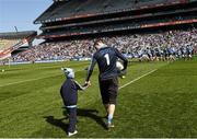 27 April 2014; The Dublin captain Stephen Cluxton with six year old Darragh Oaks, from Finglas, Dublin, before the game. Allianz Football League Division 1 Final, Dublin v Derry, Croke Park, Dublin. Picture credit: Ray McManus / SPORTSFILE