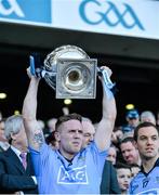 27 April 2014; Davy Byrne, Dublin, lifts the cup at the end of the game. Allianz Football League Division 1 Final, Dublin v Derry, Croke Park, Dublin.  Picture credit: Ray McManus / SPORTSFILE