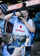 27 April 2014; A young Dublin supporter poses for a photograph with the cup after the game. Allianz Football League Division 1 Final, Dublin v Derry, Croke Park, Dublin.  Picture credit: Ray McManus / SPORTSFILE