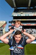 27 April 2014; Seán Currie, Dublin, celebrates with his nephew Bobby Currie after the game. Allianz Football League Division 1 Final, Dublin v Derry, Croke Park, Dublin.  Picture credit: Ray McManus / SPORTSFILE