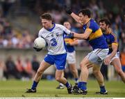 29 May 2016; Lorcan O Corraoin of Waterford in action against Ciaran McDonald of Tipperary in the Munster GAA Football Senior Championship quarter-final between Waterford and Tipperary at Fraher Field, Dungarvan, Co. Waterford. Photo by Matt Browne/Sportsfile