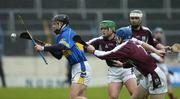 26 March 2006; Colin Morrissey, Tipperary, in action against Galway's, from left, Fergal Healy, David Collins, 7, and Richie Murray. Allianz National Hurling League, Division 1B, Round 4, Tipperary v Galway, Semple Stadium, Thurles, Co. Tipperary. Picture credit: Ray McManus / SPORTSFILE