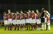 24 March 2006; St. Patrick's Athletic team stand for a minute silence before the start of the game. eircom League, Premier Division, St. Patrick's Athletic v Shelbourne, Richmond Park, Dublin. Picture credit: David Maher / SPORTSFILE