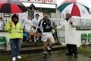 26 March 2006; Enda Murphy, Kildare, leads the Kildare team out for the start of the game. Allianz National Football League, Division 1B, Round 6, Kildare v Wexford, St. Conleth's Park, Newbridge, Co. Kildare. Picture credit: David Maher / SPORTSFILE