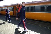 31 March 2006; Munster players Paul O'Connell and Tomas O'Leary, left, on their arrival at Heuston Station for their Heineken Cup Quarter-Final game against Perpignan. Heuston Station, Dublin. Picture credit: Brendan Moran / SPORTSFILE