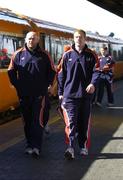 31 March 2006; Munster players John Hayes, left, and Paul O'Connell on their arrival at Heuston Station for their Heineken Cup Quarter-Final game against Perpignan. Heuston Station, Dublin. Picture credit: Brendan Moran / SPORTSFILE