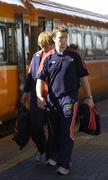 31 March 2006; Munster players Jerry Flannery, left, and Marcus Horan on their arrival at Heuston Station for their Heineken Cup Quarter-Final game against Perpignan. Heuston Station, Dublin. Picture credit: Brendan Moran / SPORTSFILE