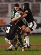 31 March 2006; Keith Mathews, Connacht, is tackled by Jamie Noon and Mark Mayerhgofler, Newcastle Falcons. European Challenge Cup 2005-2006, Quarter-Final, Newcastle Falcons v Connacht, Kingston Park, Newcastle, England. Picture credit: Ray Ryan / SPORTSFILE