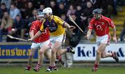 2 April 2006; David O'Connor, Wexford, in action against Brian Corcoran, right, and Kieran Murphy, Cork. Allianz National Hurling League, Division 1A, Round 4, Wexford v Cork, Wexford Park, Wexford. Picture credit: Pat Murphy / SPORTSFILE