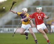 2 April 2006; Niall McCarthy, Cork, in action against Ciaran Kenny, Wexford. Allianz National Hurling League, Division 1A, Round 4, Wexford v Cork, Wexford Park, Wexford. Picture credit: Pat Murphy / SPORTSFILE