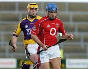 2 April 2006; Tom Kenny, Cork, in action against Eoin Quigley, Wexford. Allianz National Hurling League, Division 1A, Round 4, Wexford v Cork, Wexford Park, Wexford. Picture credit: Pat Murphy / SPORTSFILE