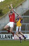 2 April 2006; John Gardiner, Cork, in action against Darren Stamp, Wexford. Allianz National Hurling League, Division 1A, Round 4, Wexford v Cork, Wexford Park, Wexford. Picture credit: Pat Murphy / SPORTSFILE