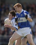 2 April 2006; Colm Kelly, Laois, in action against Peter Foy, Longford. Cadburys Leinster U21 Football Final, Longford v Laois, Pearse Park, Longford. Picture credit: Ray McManus / SPORTSFILE
