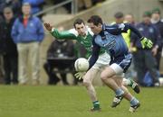 19 March 2006; Declan Lally, Dublin, is tackled by Raymond Johnson, Fermanagh. Allianz National Football League, Division 1A, Round 5, Fermanagh v Dublin, Brewster Park, Enniskillen, Co. Fermanagh. Picture credit: Damien Eagers / SPORTSFILE