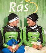 18 May 2014; An Post Chain Reaction team-mates, second placed Shane Archbold, left, and stage winner Robert Jon McCarthy sit on the podium after Stage 1 of the 2014 An Post Rás. Dunboyne - Roscommon. Picture credit: Ramsey Cardy / SPORTSFILE