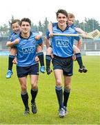 20 May 2014; Dublin GAA stars Bernard Brogan, Danny Sutcliffe, Ciara Ruddy and Ali Twomey helped launch AIG’s jersey promotion at Parnell Park today. AIG is rewarding customers who take out a new car or home insurance policy from www.aig.ie or 1890 27 27 27 with a free kids’ Dublin jersey, or €40 off an adults’ Dublin jersey. The offer runs from May 19th to June 30th.  Vouchers are redeemable on the O’Neills’ website before July 31st. Pictured at the launch are Dublin's Bernard Brogan and Danny Sutcliffe with Shane Delaney, left, and Jason Hartford, both from Scoil Chiarain, Glasnevin, Dublin. Parnell Park, Dublin. Picture credit: David Maher / SPORTSFILE
