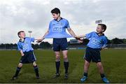 20 May 2014; Dublin GAA stars Bernard Brogan, Danny Sutcliffe, Ciara Ruddy and Ali Twomey helped launch AIG’s jersey promotion at Parnell Park today. AIG is rewarding customers who take out a new car or home insurance policy from www.aig.ie or 1890 27 27 27 with a free kids’ Dublin jersey, or €40 off an adults’ Dublin jersey. The offer runs from May 19th to June 30th. Vouchers are redeemable on the O’Neills’ website before July 31st. Pictured at the launch isas Dublin's Bernard Brogan with Jason Hartford, left, and Shane Delaney, both from Scoil Chiarain, Glasnevin, Dublin. Parnell Park, Dublin. Picture credit: David Maher / SPORTSFILE
