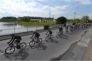 20 May 2014; The peloton rides through Clarecastle, Co. Clare, during Stage 3 of the 2014 An Post Rás. Lisdoonvarna - Charleville. Picture credit: Ramsey Cardy / SPORTSFILE