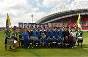 20 May 2014; Former Republic of Ireland international Ray Houghton, holding the FAI Junior Cup, along with players and members of Ballynanty Rovers AFC during the FAI Junior Cup Aviva Communities Day ahead of Sunday's Final at the Aviva Stadium. Thomond Park, Limerick. Picture credit: Diarmuid Greene / SPORTSFILE