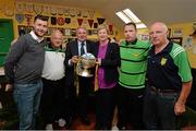 20 May 2014; From left to right, Alan Cawley, St. Michael's AFC kitman Jimmy Tobin, former Republic of Ireland international Ray Houghton, FAI Junior Council President Teresa McCabe,  St. Michael's AF player Chris Higgins,  and St. Michael's AFC president Michael Flynn during the FAI Junior Cup Aviva Communities Day ahead of Sunday's Final at the Aviva Stadium. St. Michael's AFC Clubhouse, Cooke Park, Tipperary Town. Picture credit: Diarmuid Greene / SPORTSFILE