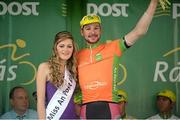 20 May 2014; Jan Sokol, Synergy Baku Cycling, is presented with the LeasePlan stage winner jersey by Miss An Post Rás Charleville Laura Dundon after Stage 3 of the 2014 An Post Rás. Lisdoonvarna - Charleville. Picture credit: Ramsey Cardy / SPORTSFILE