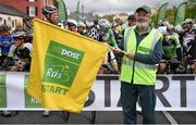 20 May 2014; Local Lisdoonvarna postman Kevin Connolly gets Stage 3 of the 2014 An Post Rás underway. Lisdoonvarna - Charleville. Picture credit: Ramsey Cardy / SPORTSFILE