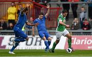 20 May 2014; Mark O'Sullivan, Cork City, in action against Shaun Kelly and Samuel Oji, left, Limerick FC. SSE Airtricity League Premier Division, Limerick v Cork City, Thomond Park, Limerick. Picture credit: Diarmuid Greene / SPORTSFILE