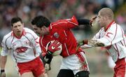 2 April 2006; David Niblock, Cork, in action against Kevin Hughes, Tyrone. Allianz National Football League, Division 1A, Round 3, Tyrone v Cork, Healy Park, Omagh, Co. Tyrone. Picture credit: Brendan Moran / SPORTSFILE