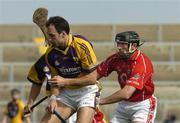 2 April 2006; Darragh Ryan, Wexford, in action against Brian Corcoran, Cork. Allianz National Hurling League, Division 1A, Round 4, Wexford v Cork, Wexford Park, Wexford. Picture credit: Pat Murphy / SPORTSFILE