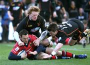 7 April 2006; Munster's Trevor Halstead goes over to score a try. Celtic League 2005-2006, Newport Gwent Dragons v Munster, Rodney Parade, Newport, Wales. Picture credit: Tim Parfitt / SPORTSFILE