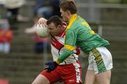 9 April 2006; Paddy Bradley, Derry, in action against Caoimhin King, Meath. Allianz National Football League, Division 1B, Round 7, Meath v Derry, Pairc Tailteann, Navan, Co. Meath. Picture credit: Pat Murphy / SPORTSFILE