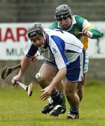 9 April 2006; Paul Flynn, Waterford, in action against Brendan O'Meara, Offaly. Allianz National Hurling League, Division 1A, Round 5, Offaly v Waterford, St. Brendan's Park, Birr, Co. Offaly. Picture credit: David Maher / SPORTSFILE